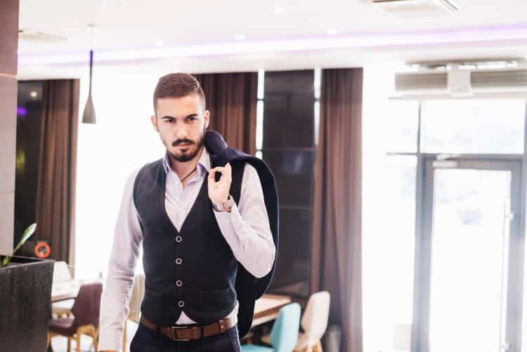 how to wear a vest for a man