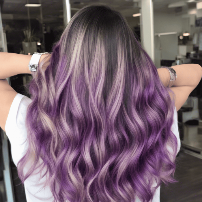 Long hair with a blonde and purple ombre, styled in soft waves.