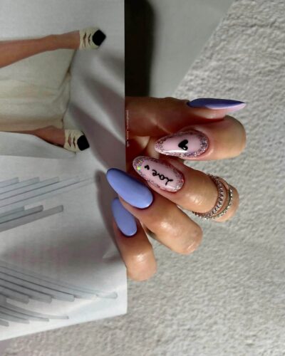 A variety of purple and pink nails, some with glitter detailing, against a modern geometric paper background.