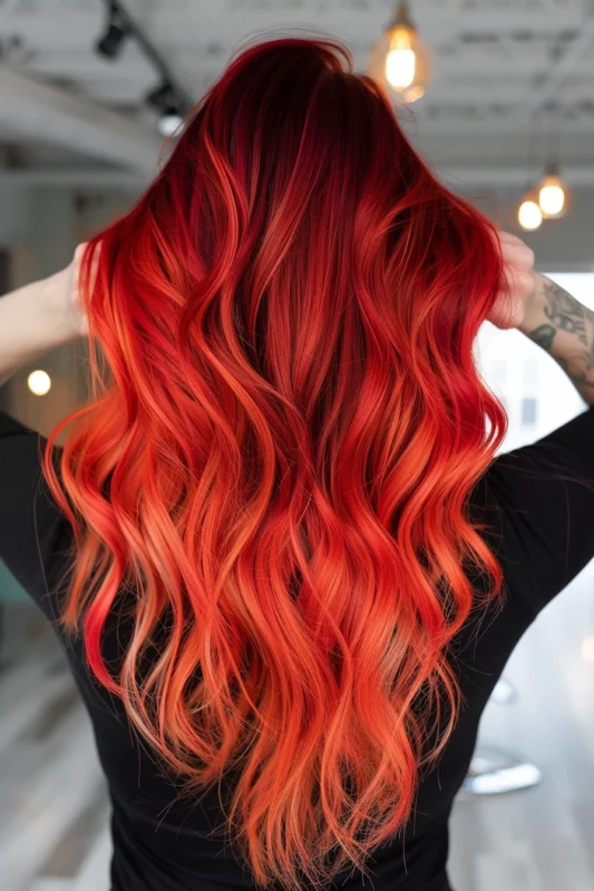Woman with bright red ombre hair