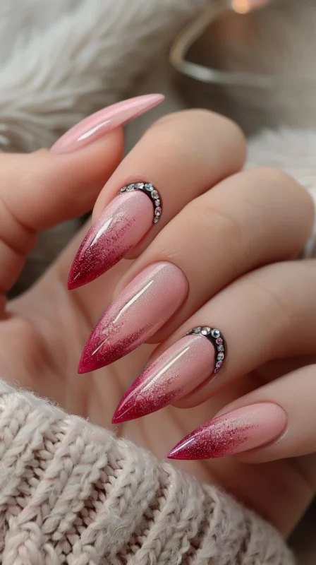 Textured dark red French tip nails with glitter detail.