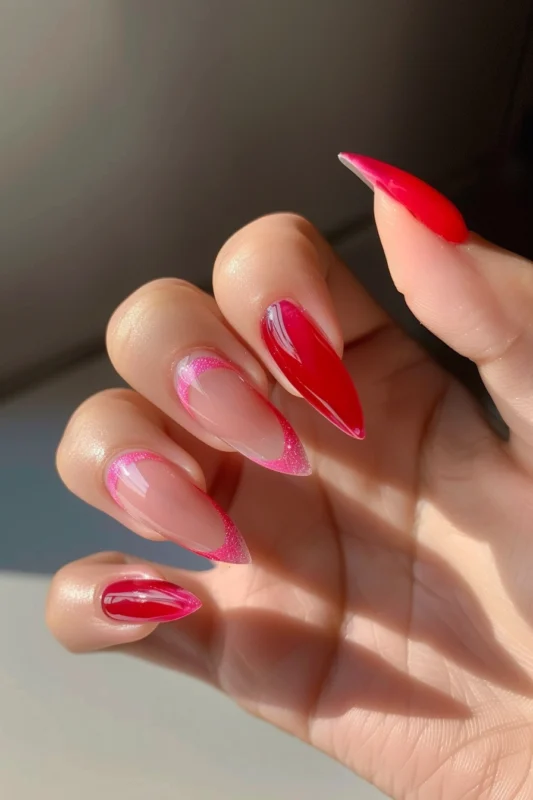 Pink gradient French tips and vibrant pink nails.