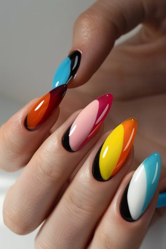 Colorful French tips on almond nails.