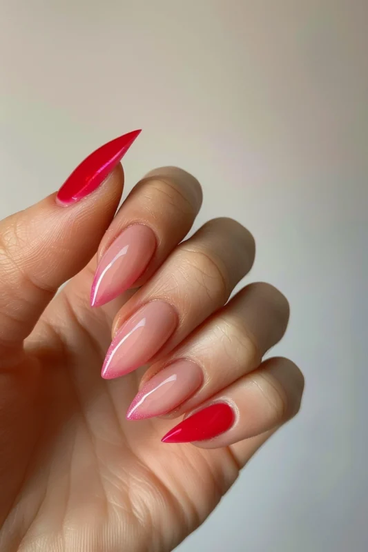 Almond nails with magenta colored nails and light pink French tips.