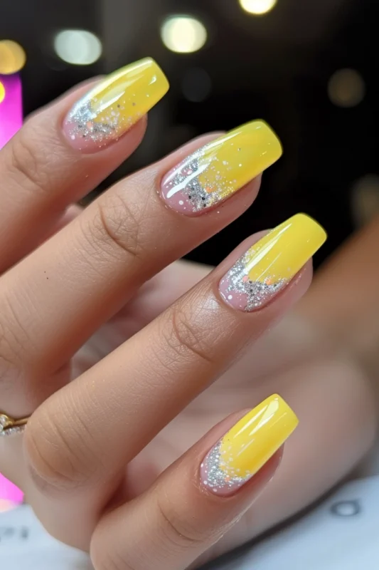 Yellow tips fading into a glitter base.