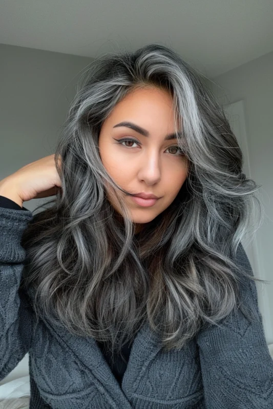 Natural-looking silvery gray highlights in dark hair.