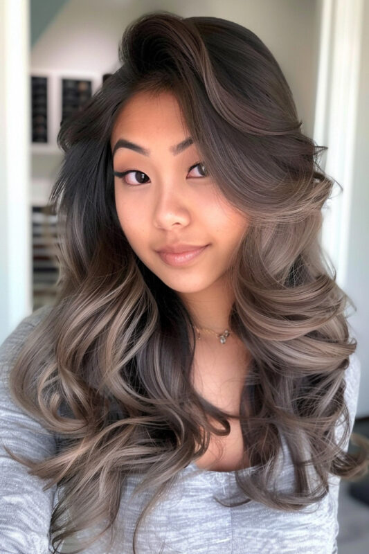 A woman with mushroom brown hair color, a cool, earthy brown shade with ashy undertones.