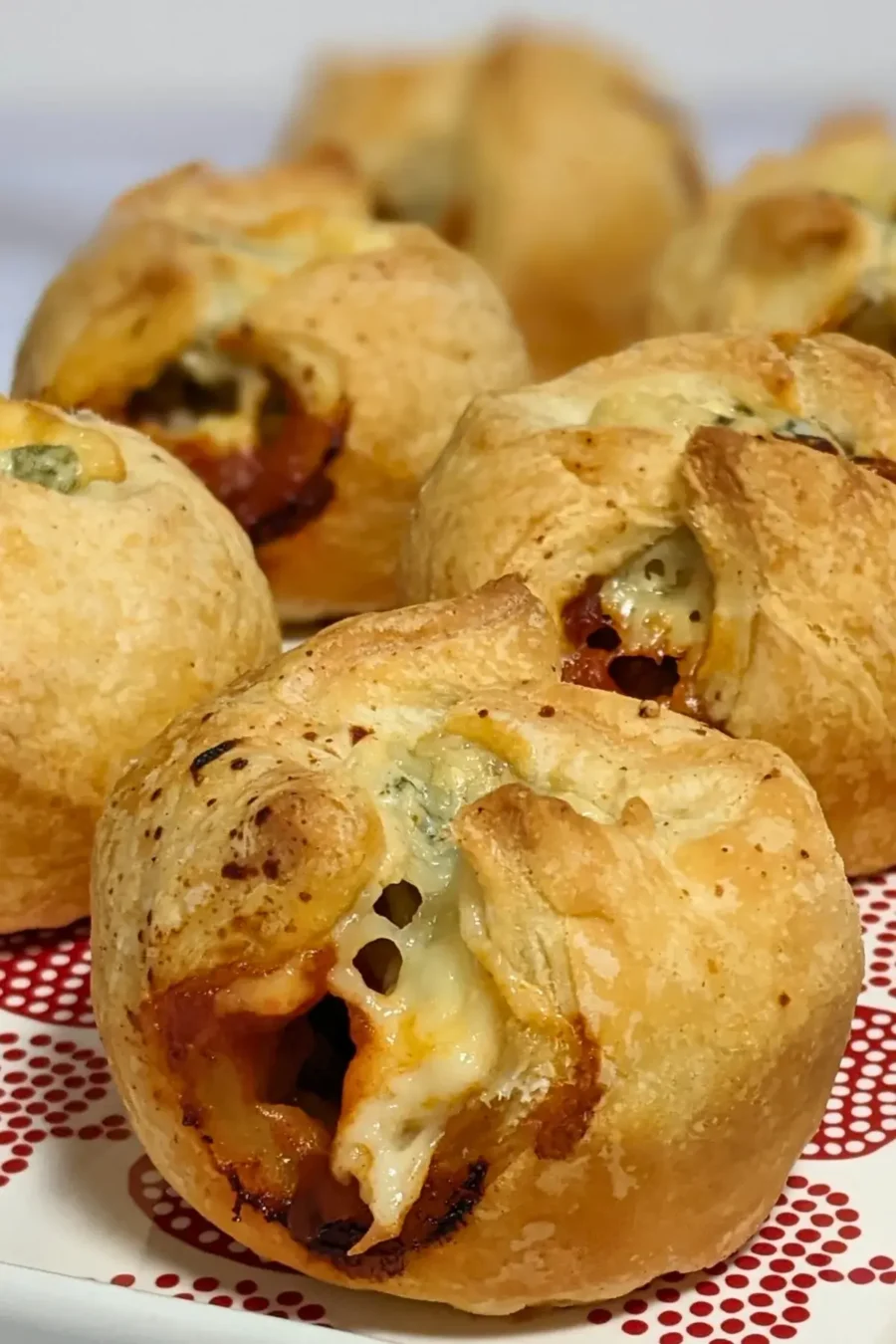 Prosciutto and blue cheese puff pastry appetizers - savory puff pastry cups filled with sweet chili sauce, prosciutto and blue cheese.