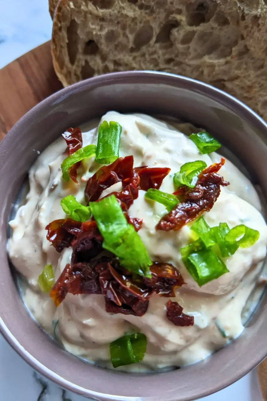 Sundried tomato feta dip - creamy feta dip blended with sundried tomatoes and herbs, perfect for crackers or fresh bread.