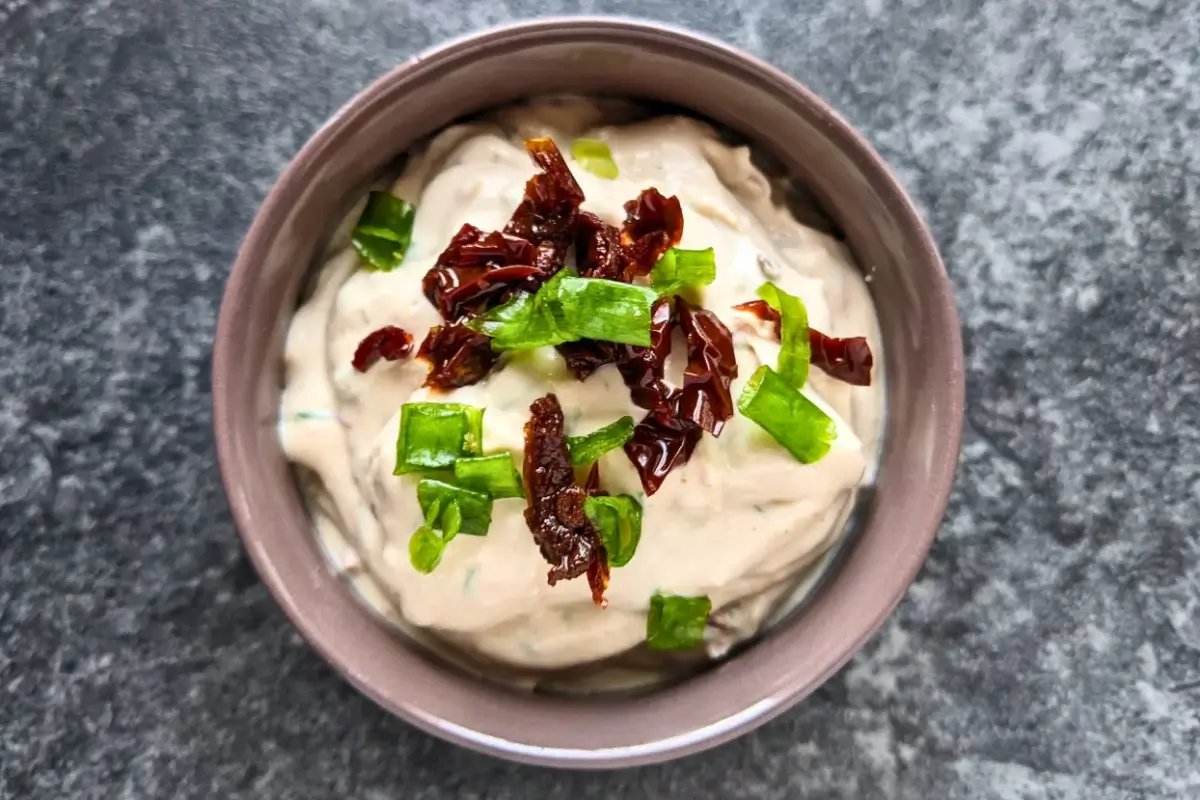 Sundried tomato feta dip - creamy feta dip blended with sundried tomatoes and herbs, perfect for crackers or fresh bread.