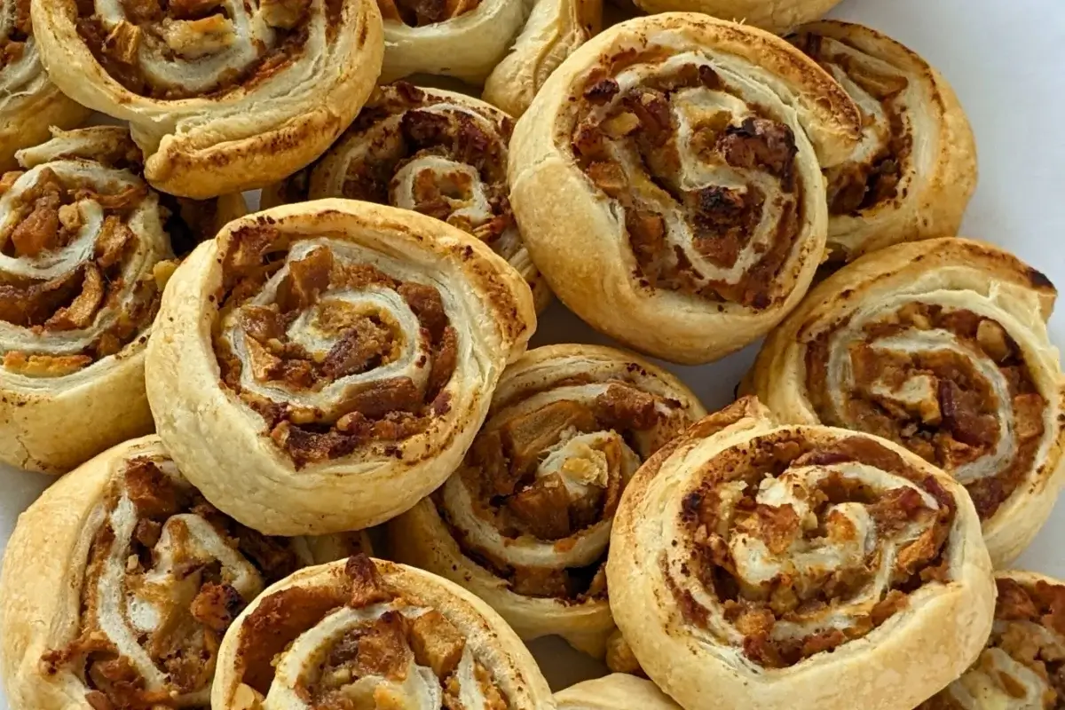 Apple puff pastry rolls with ricotta - Rolled puff pastry filled with ricotta, cinnamon apples, and walnuts.