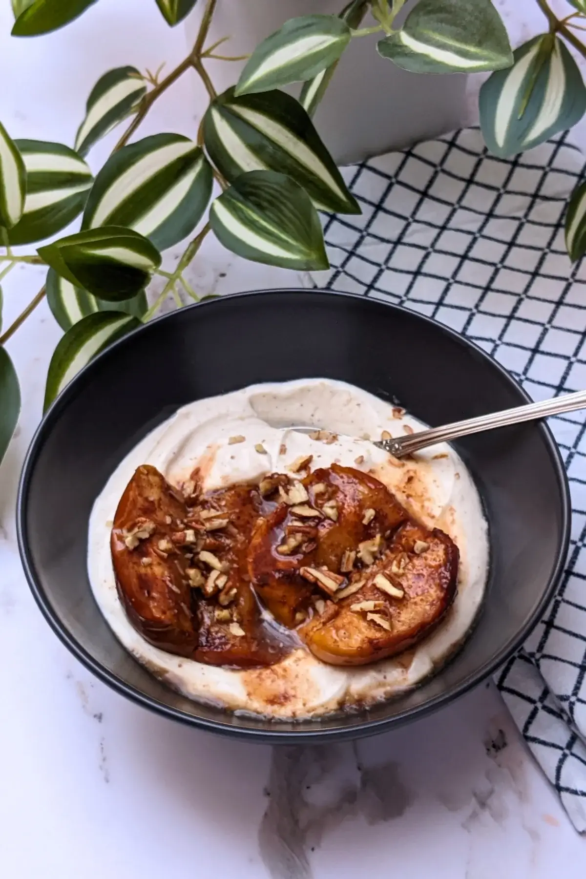 Baked apples with mascarpone cream - a dessert with cinnamon, cardamom, and pumpkin spiced oven-baked apples served with a fluffy mascarpone and Greek yogurt cream.