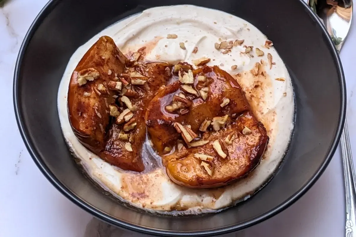 Baked apples with mascarpone cream - a dessert with cinnamon, cardamom, and pumpkin spiced oven-baked apples served with a fluffy mascarpone and Greek yogurt cream.