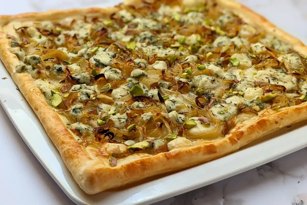 Caramelized Onion, Pear, and Blue Cheese Puff Pastry Tart - puff pastry appetizer with caramelized onions, fresh pears and crumbled blue cheese.