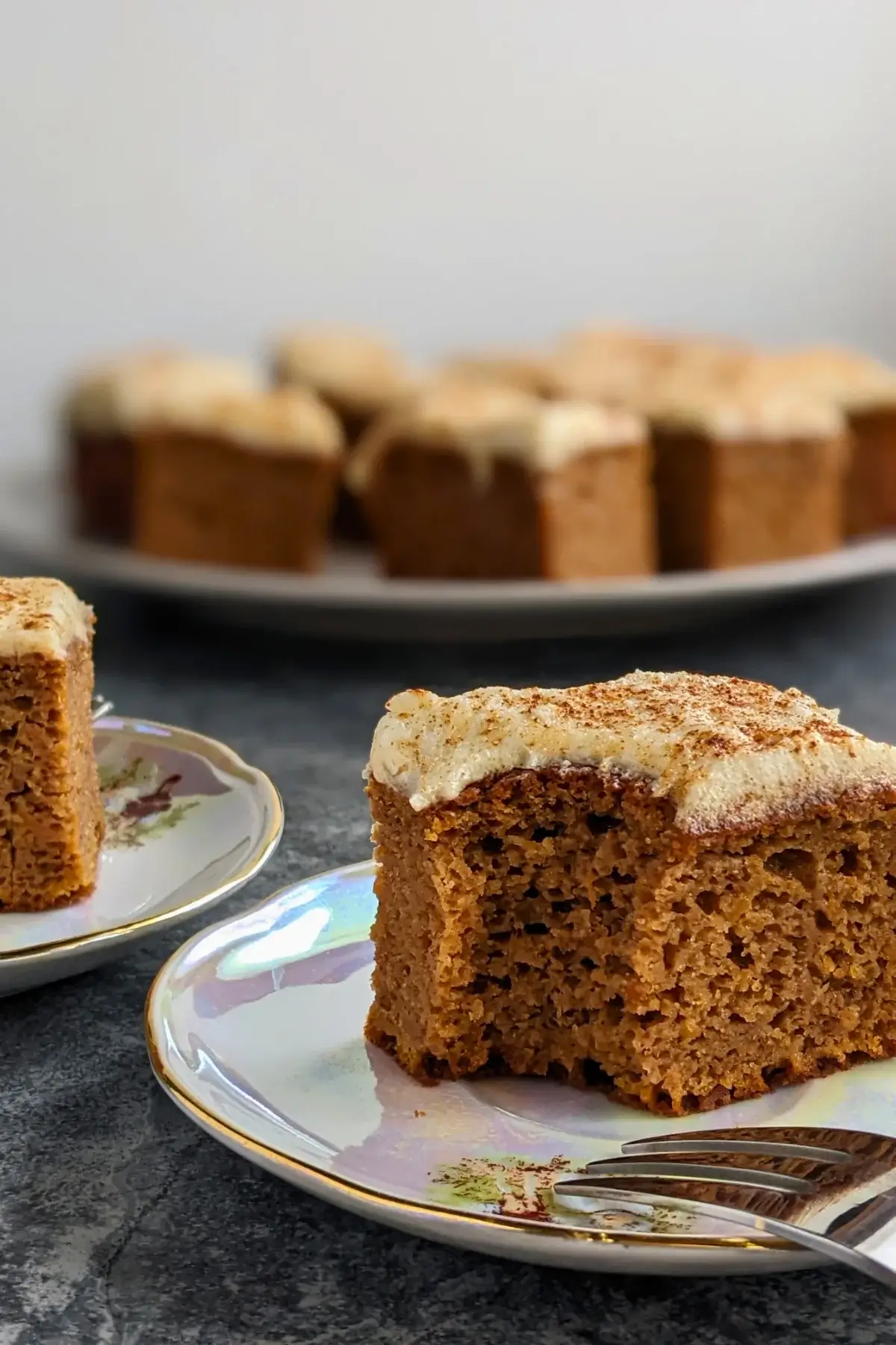 Pumpkin bars made with applesauce and topped with light, sugar-free frosting.