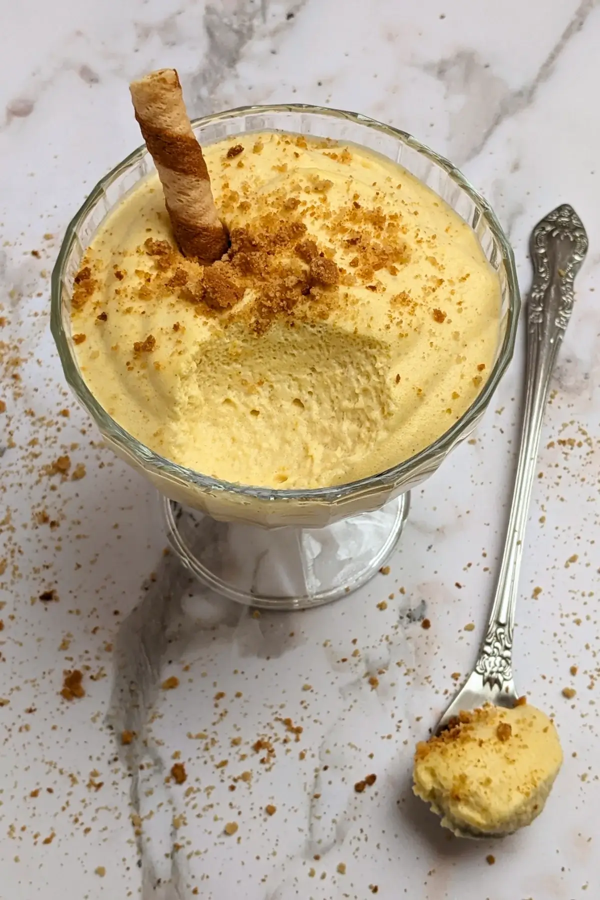 Pumpkin mousse - a fluffy and airy pumpkin dessert with whipped egg whites, whipped cream, pumpkin puree, sugar, and spices.