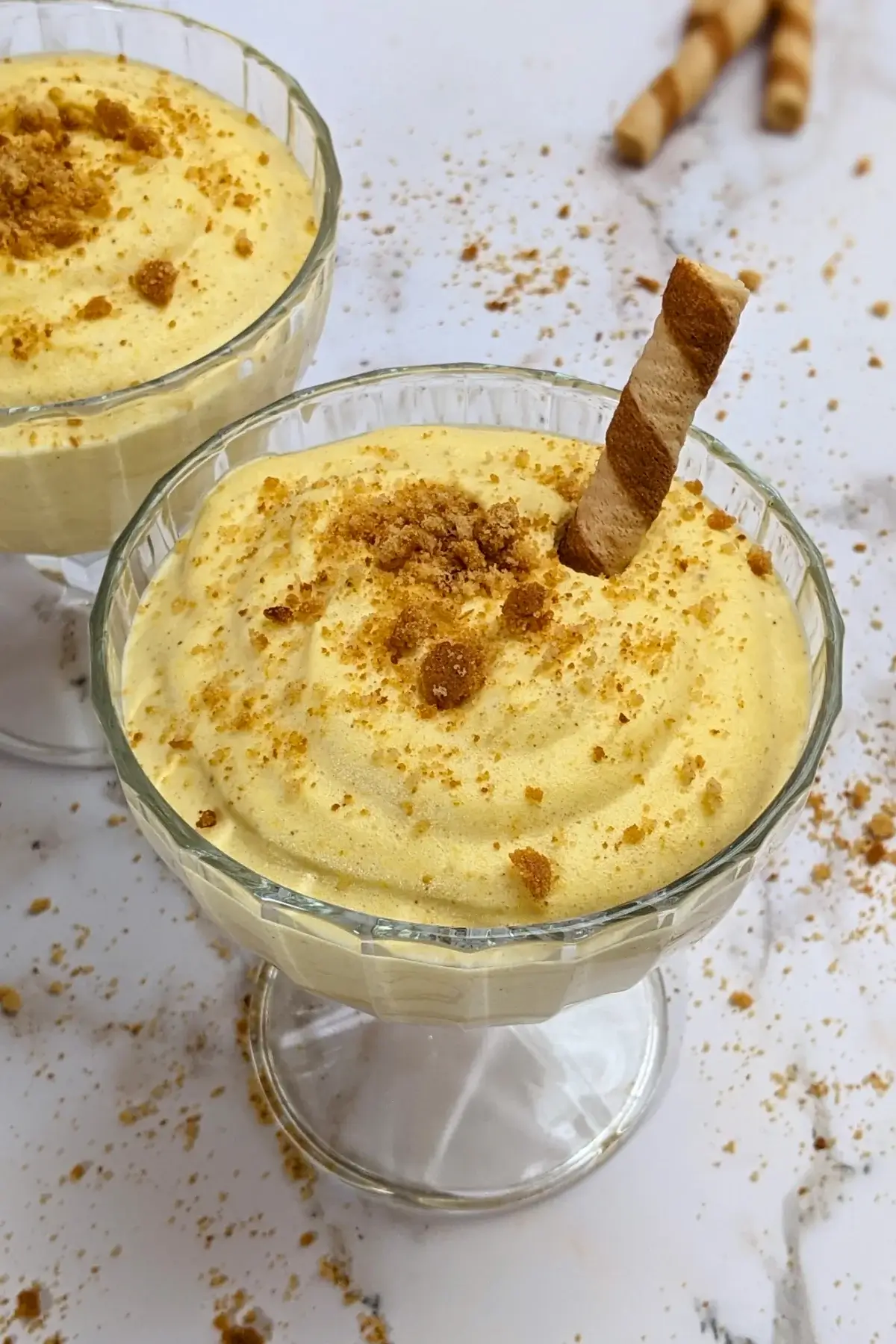 Pumpkin mousse - a fluffy and airy pumpkin dessert with whipped egg whites, whipped cream, pumpkin puree, sugar, and spices.