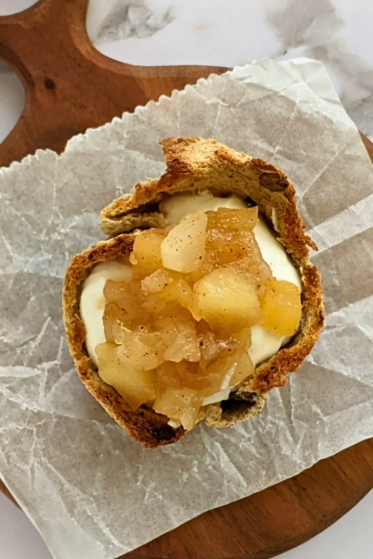Ricotta and homemade apple sauce dessert toast cups - Muffin tin toasted bread cups with creamy ricotta filling and a generous spoonful of spiced homemade apple sauce.