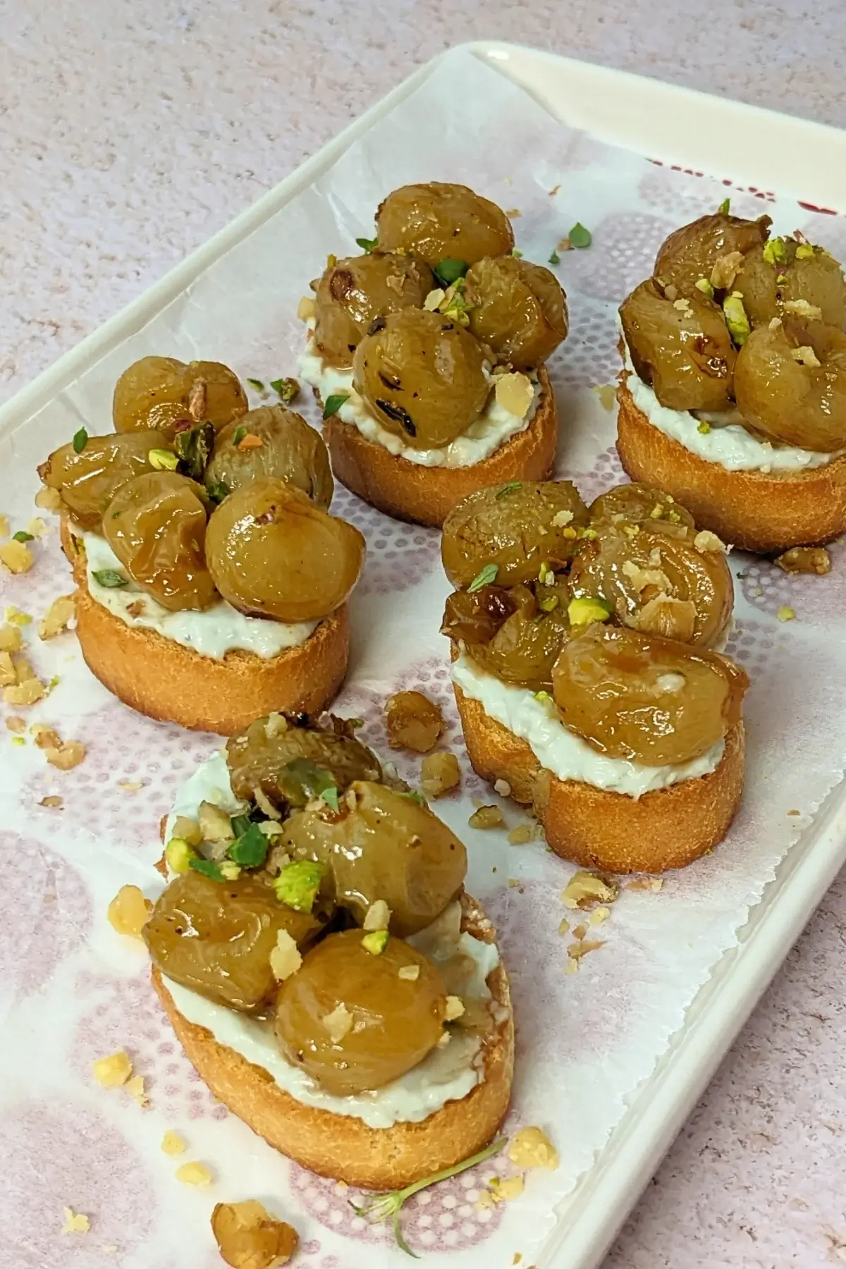 Whipped Blue Cheese Crostini Appetizers With Roasted Grapes - Italian toasts with oven roasted grapes and whipped blue cheese.