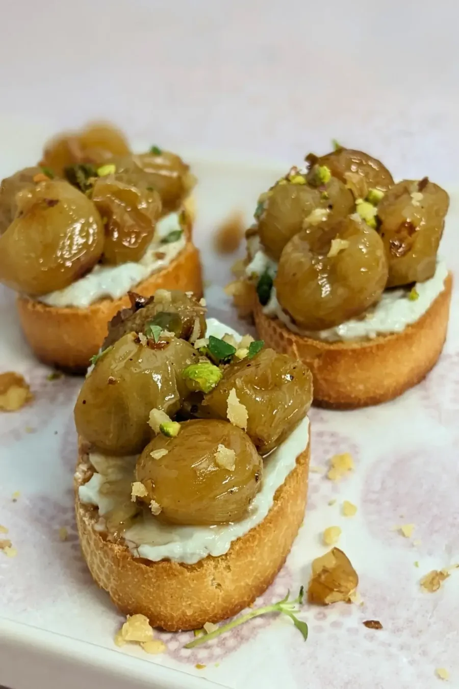 Whipped Blue Cheese Crostini Appetizers With Roasted Grapes - Italian toasts with oven roasted grapes and whipped blue cheese.