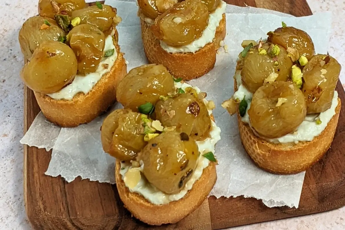 Whipped Blue Cheese Crostini Appetizers With Roasted Grapes - Italian toasts with oven roasted grapes and whipped blue cheese.