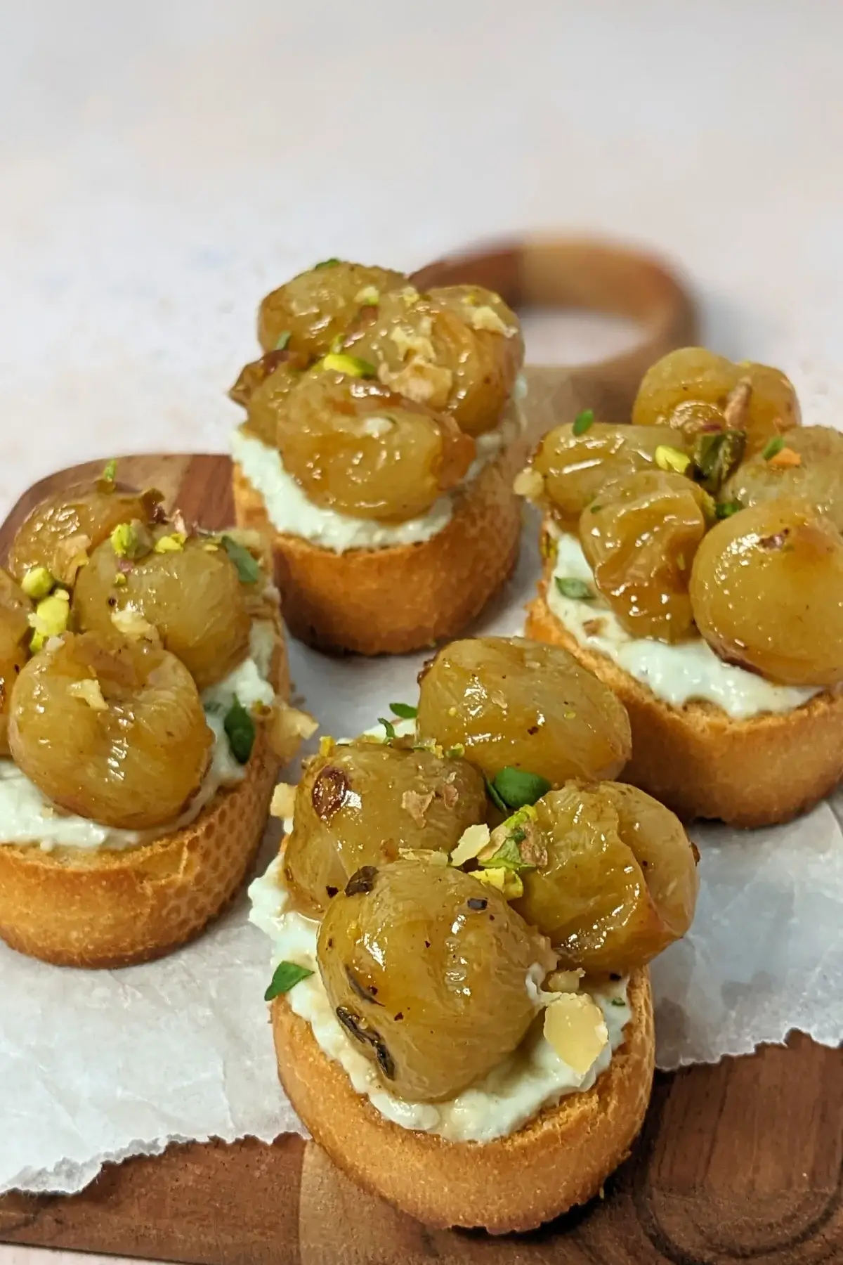 Whipped Blue Cheese Crostini Appetizers With Roasted Grapes - Italian toasts with oven roasted grapes and whipped blue cheese.