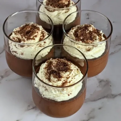 Chocolate Mousse - easy chocolate mousse dessert, made with dark chocolate, eggs, vanilla sugar, and topped with whipped cream and chocolate shavings.