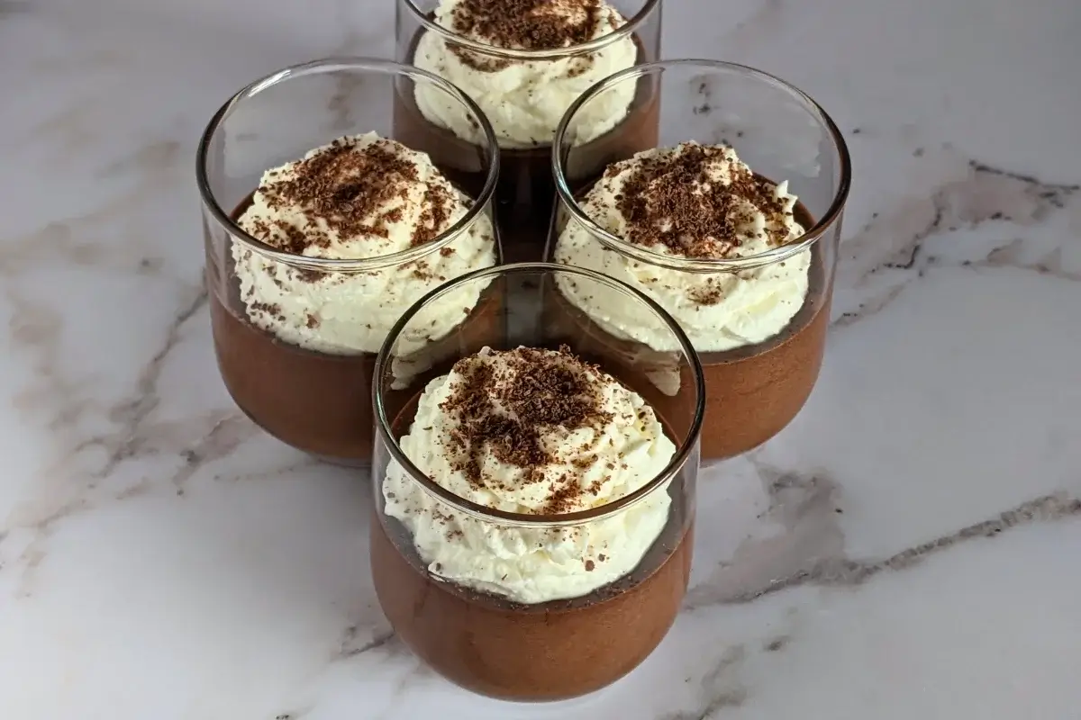 Chocolate Mousse - easy chocolate mousse dessert, made with dark chocolate, eggs, vanilla sugar, and topped with whipped cream and chocolate shavings.