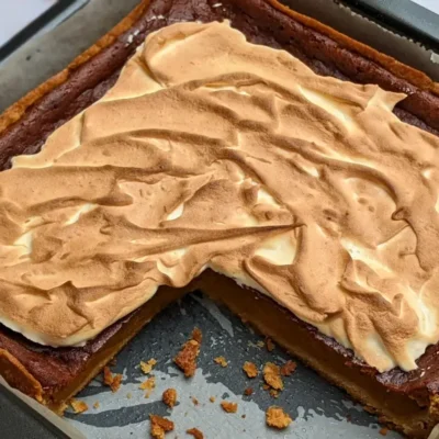 Pumpkin Pie With Toasted Pumpkin Meringue Topping - classic pumpkin pie dessert made with a homemade pumpkin puree and heavy cream filling, full of autumn spices like cinnamon and pumpkin spice, and topped with a pumpkin French meringue.