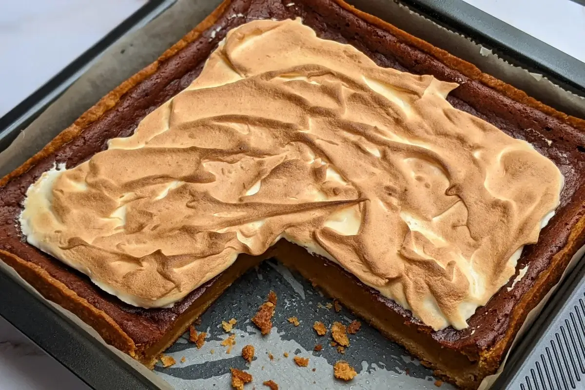 Pumpkin Pie With Toasted Pumpkin Meringue Topping - classic pumpkin pie dessert made with a homemade pumpkin puree and heavy cream filling, full of autumn spices like cinnamon and pumpkin spice, and topped with a pumpkin French meringue.