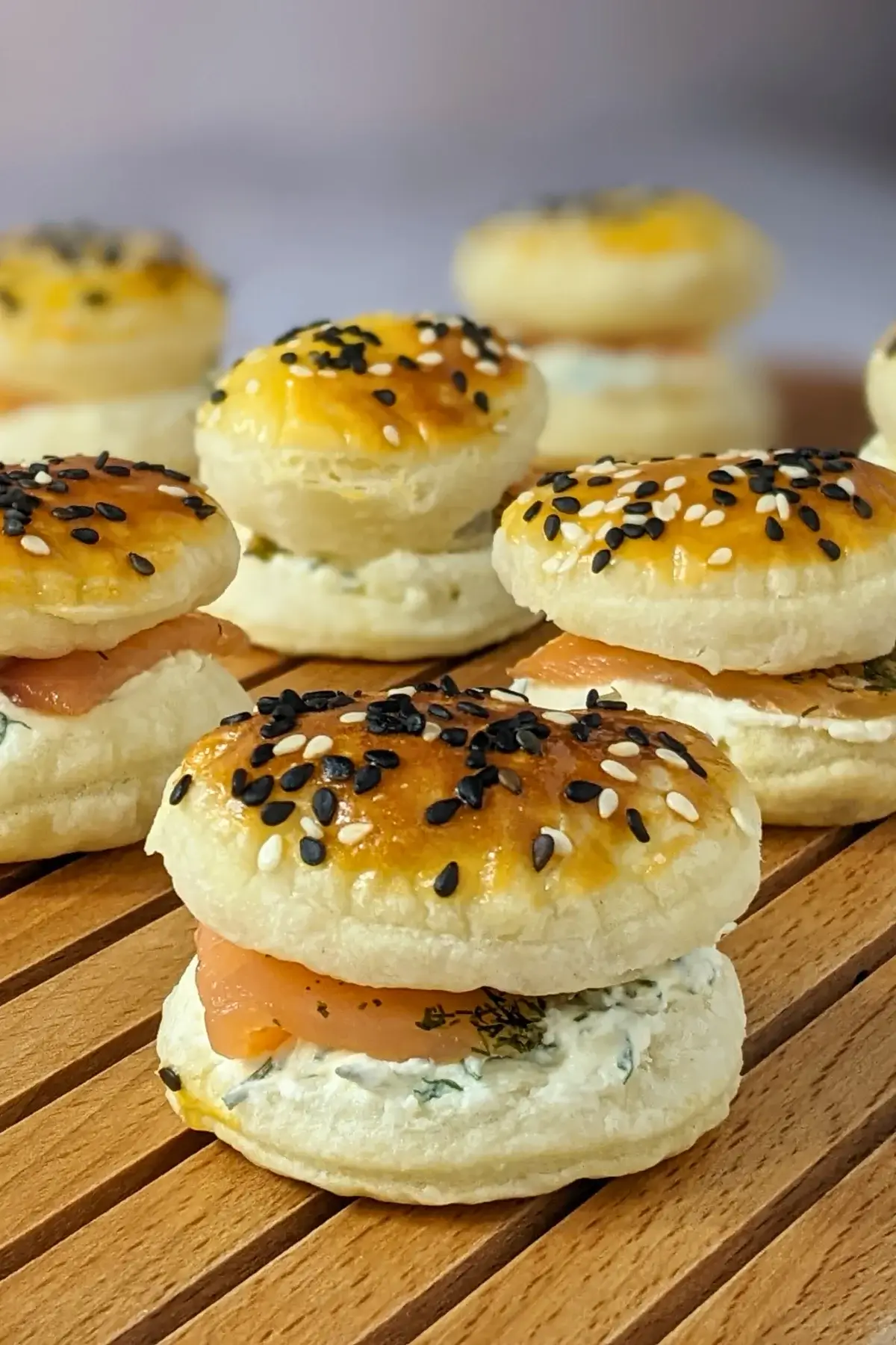 Smoked Salmon and Cream Cheese Puffs - puff pastry appetizers made with a cream cheese-dill-dried garlic filling that is topped with smoked salmon, sandwiched between homemade puff pastry shells.