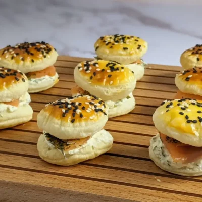 Smoked Salmon and Cream Cheese Puffs - puff pastry appetizers made with a cream cheese-dill-dried garlic filling that is topped with smoked salmon, sandwiched between homemade puff pastry shells.