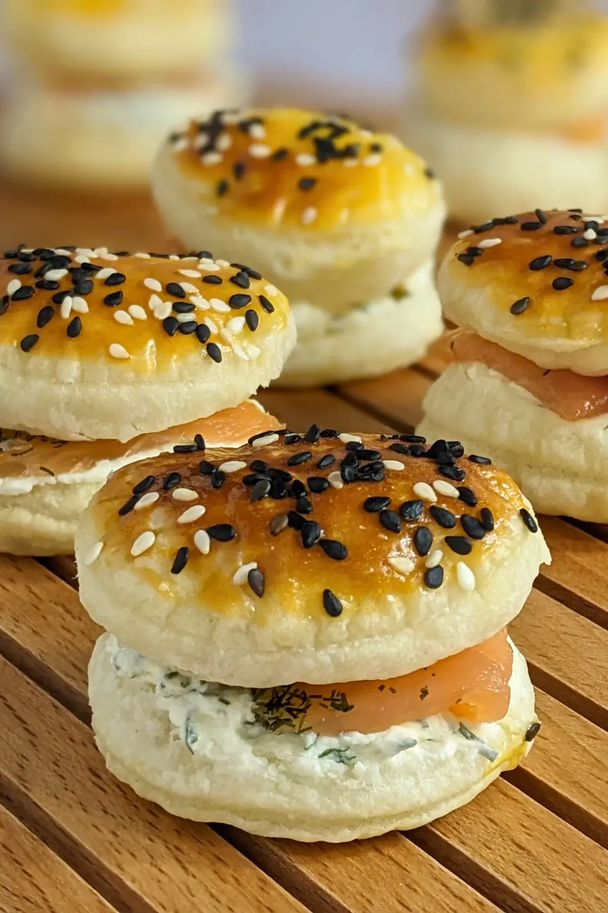 Smoked Salmon and Cream Cheese Puffs - puff pastry appetizers made with a cream cheese-dill-dried garlic filling that is topped with smoked salmon, sandwiched between homemade puff pastry shells.
