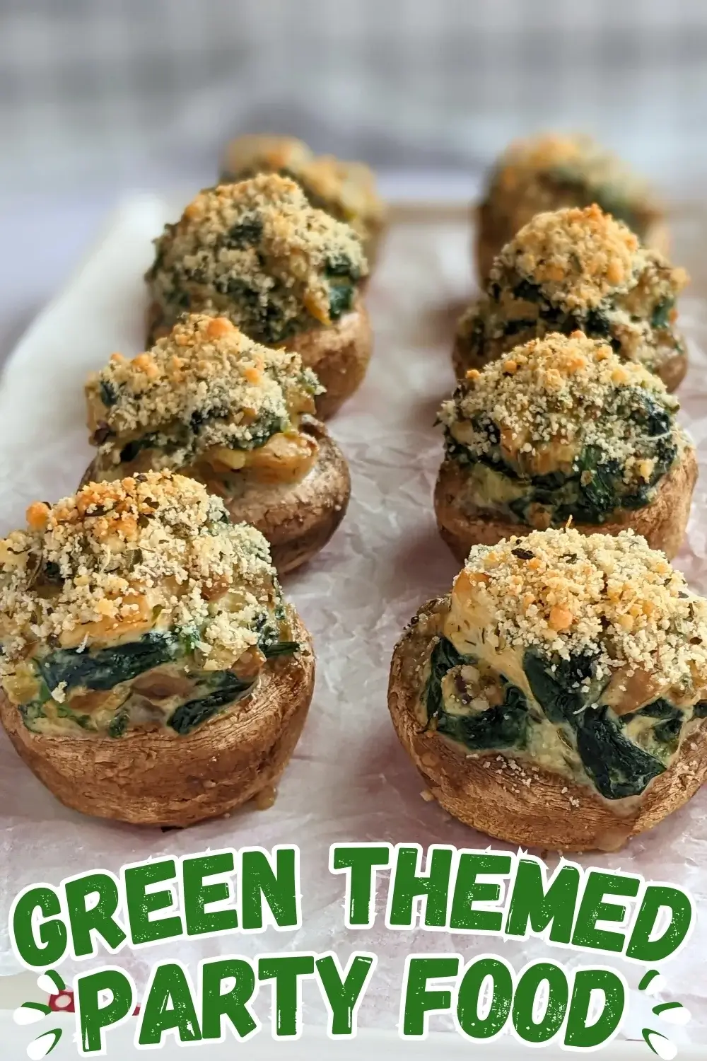 Chicken and Spinach Stuffed Mushrooms - oven-baked white button mushrooms filled with a creamy chicken, spinach, parmesan, and cream cheese filling, topped with dried breadcrumbs.
