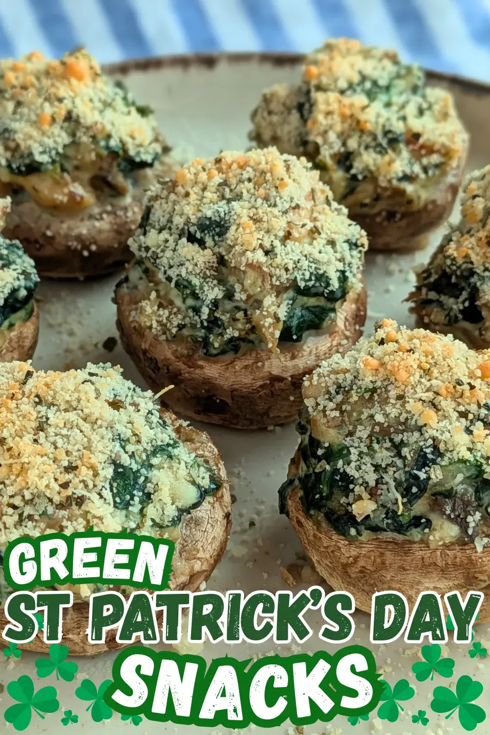 Chicken and Spinach Stuffed Mushrooms - oven-baked white button mushrooms filled with a creamy chicken, spinach, parmesan, and cream cheese filling, topped with dried breadcrumbs.