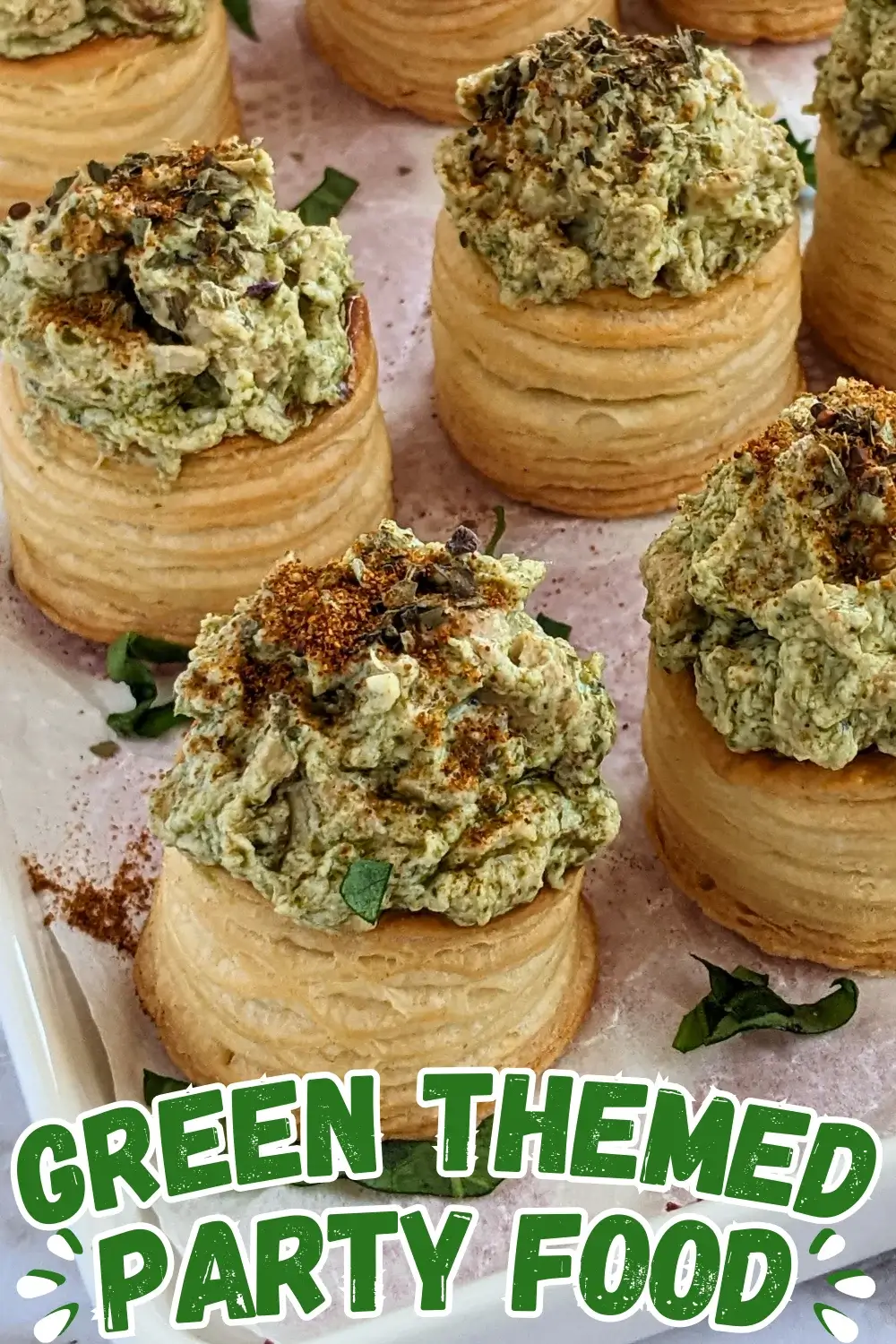Creamy Chicken Pesto Vol Au Vent Appetizers - mini puff pastry shells appetizers filled with a green, creamy ricotta, basil pesto, and chicken filling.