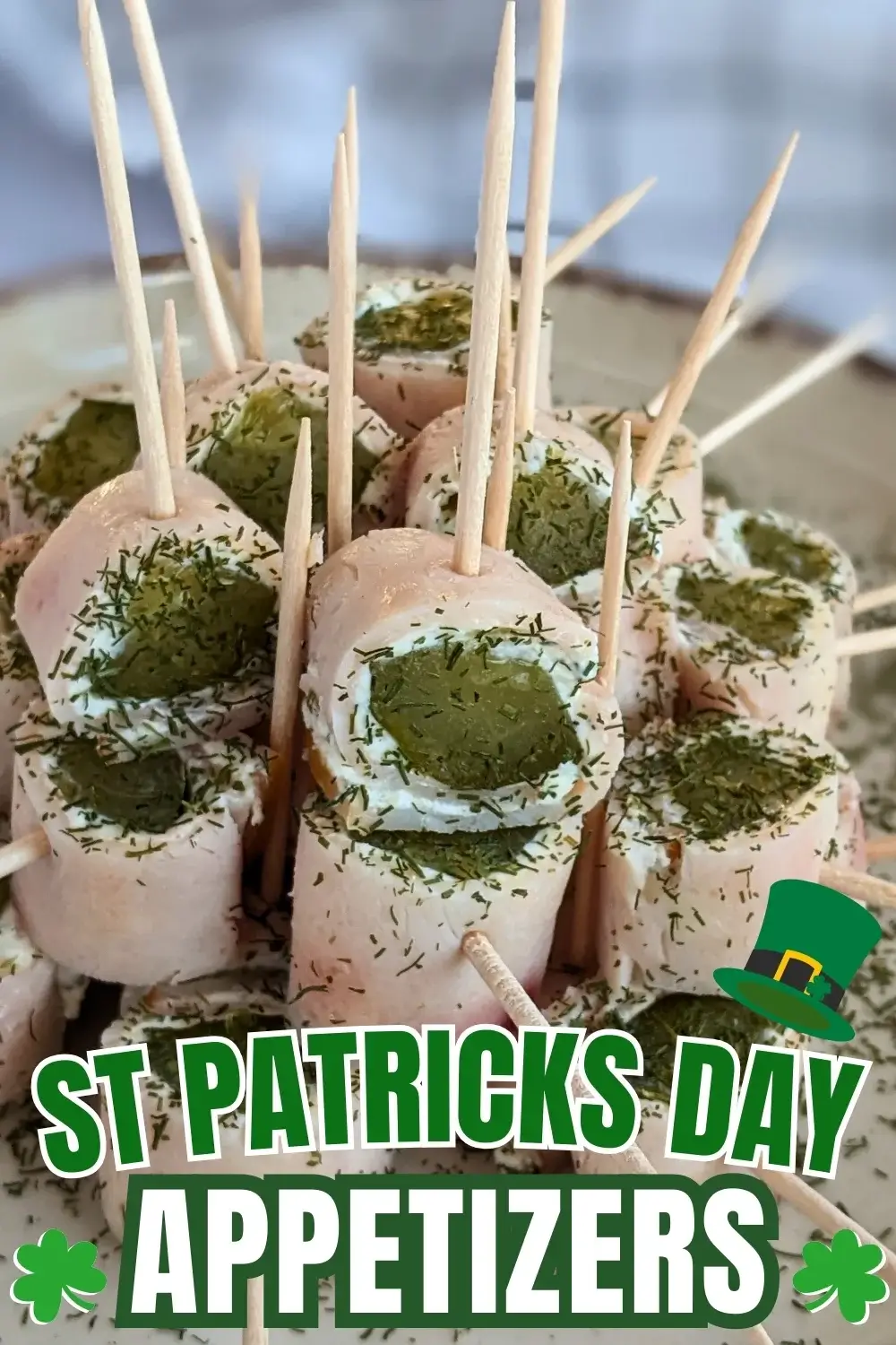 Ham Pickle Roll Ups With Garlic Cream Cheese - mini appetizer bites made with sliced breakfast ham, garlic cream cheese, and dill pickles.