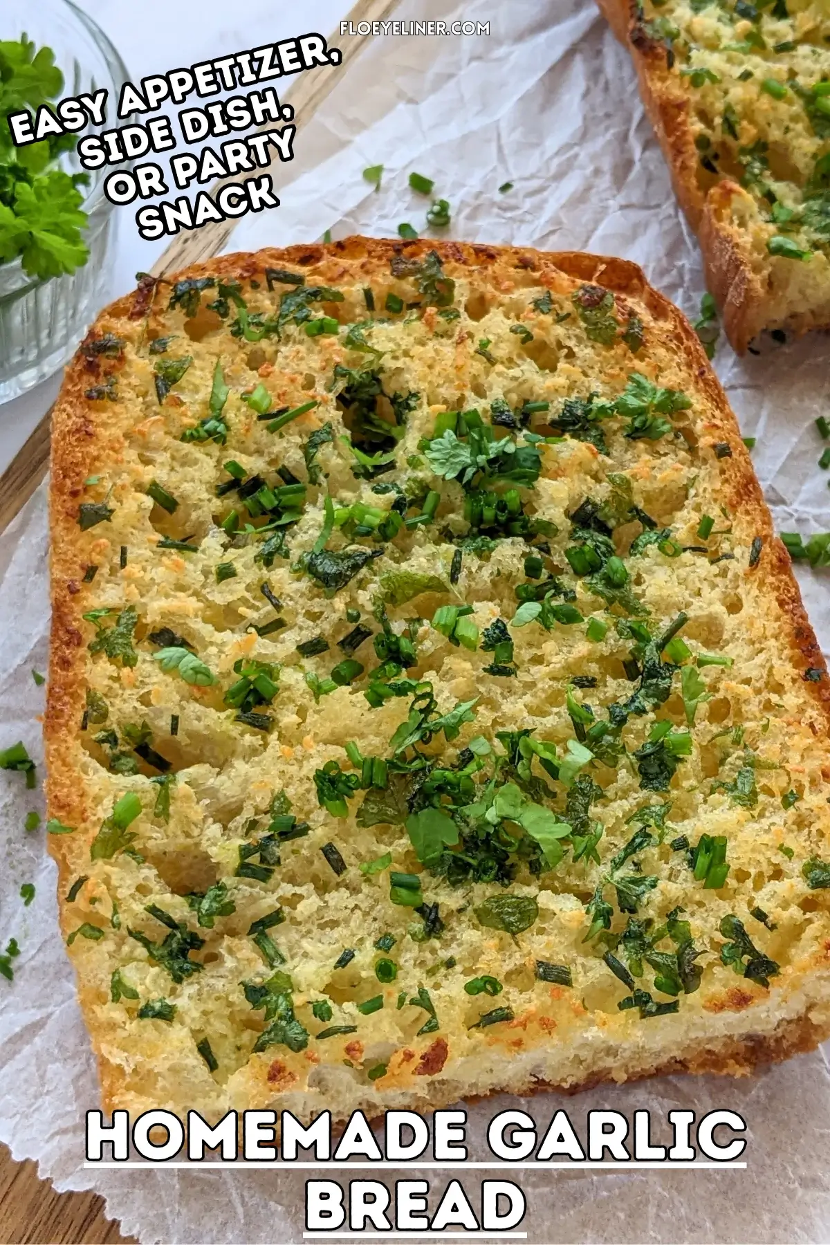 Homemade Garlic Bread - oven-toasted bread topped with creamy butter, fresh herbs like parsley and chives, and a ton of garlic.