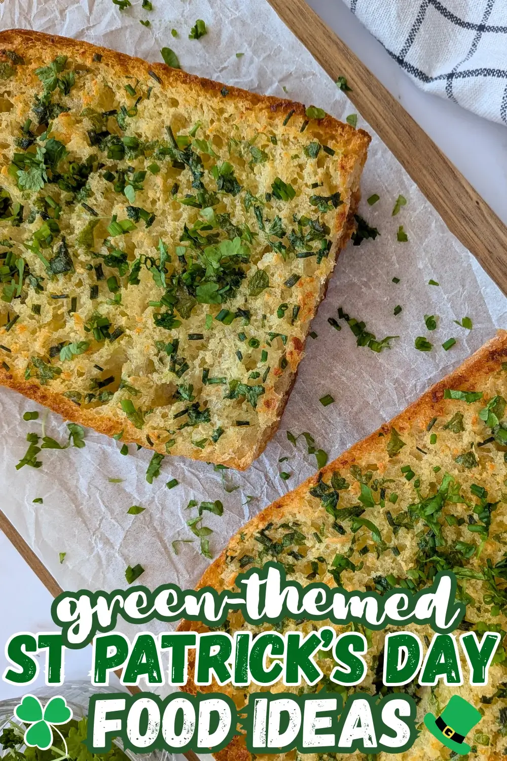 Homemade Garlic Bread - oven-toasted bread topped with creamy butter, fresh herbs like parsley and chives, and a ton of garlic.