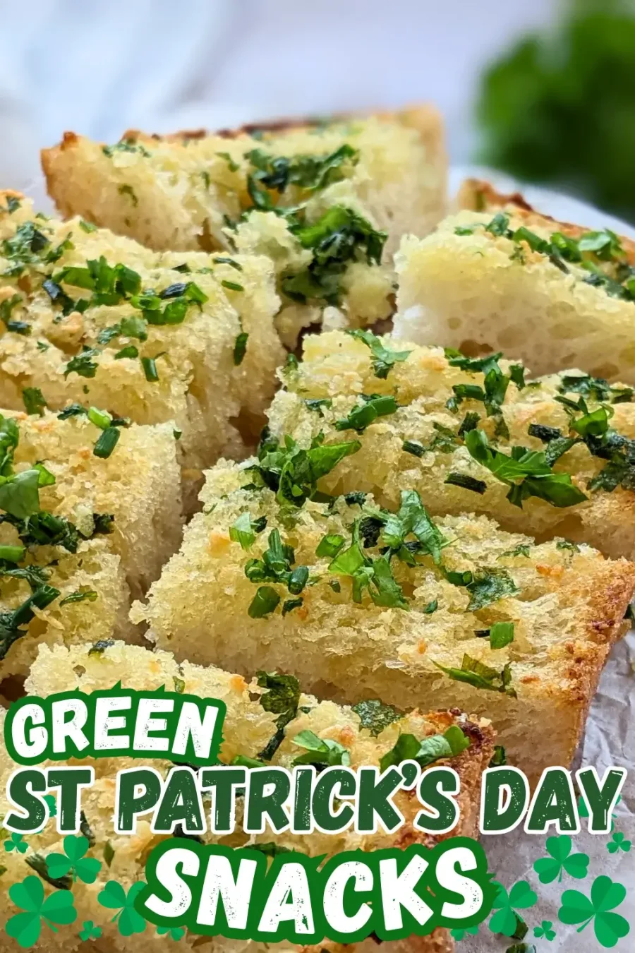 Homemade Garlic Bread - oven-toasted bread topped with creamy butter, fresh herbs like parsley and chives, and a ton of garlic.