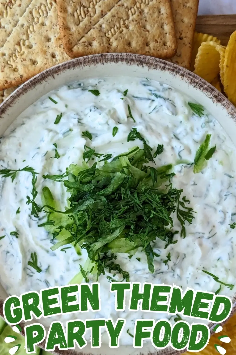 Homemade Tzatziki Sauce - authentic Greek yogurt dip made with grated cucumber, fresh mint, fresh parsley, a bit of olive oil, and freshly pressed garlic.