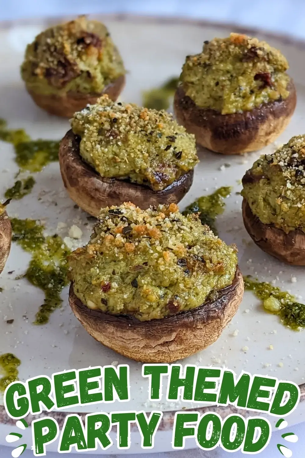 Italian-Style Stuffed Mushrooms With Pesto and Sundried Tomatoes - oven-baked white button mushrooms filled with a creamy ricotta, pesto, cream cheese, and sundried tomato filling topped with dried breadcrumbs.