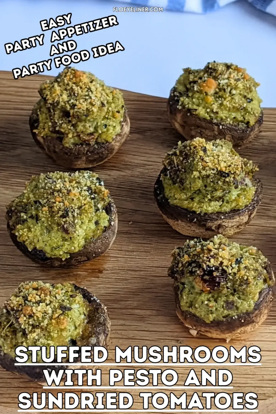 Italian-Style Stuffed Mushrooms With Pesto and Sundried Tomatoes - oven-baked white button mushrooms filled with a creamy ricotta, pesto, cream cheese, and sundried tomato filling topped with dried breadcrumbs.