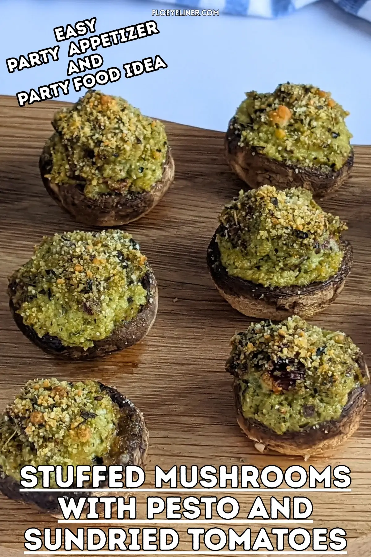 Italian-Style Stuffed Mushrooms With Pesto and Sundried Tomatoes - oven-baked white button mushrooms filled with a creamy ricotta, pesto, cream cheese, and sundried tomato filling topped with dried breadcrumbs.