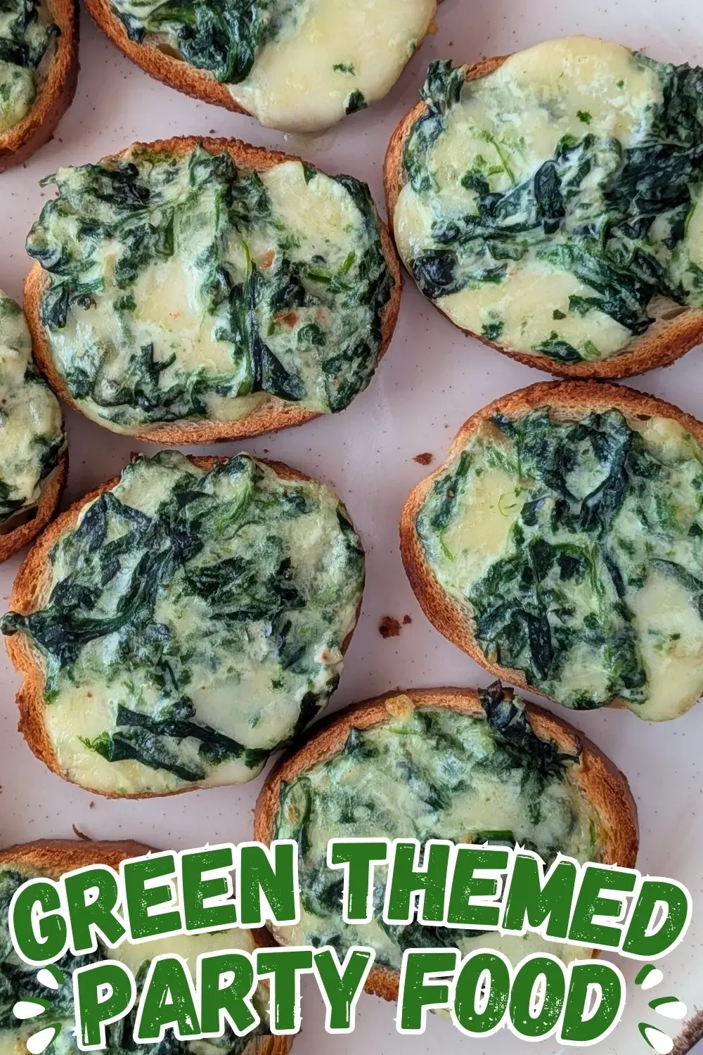 Mozzarella and Spinach Crostini Appetizers - oven baked mini toasts topped with a creamy, cheesy mozzarella, cream cheese, and spinach spread.