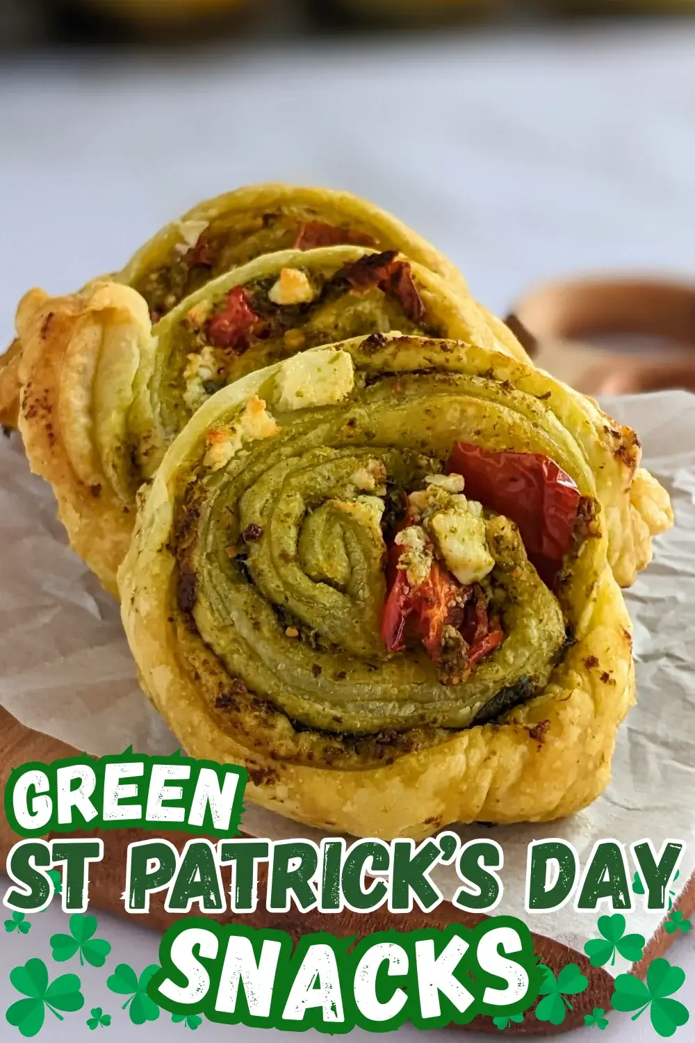 Pesto Pinwheels Appetizers - Savory pesto pinwheels appetizers made with puff pastry and filled with basil pesto, fresh cherry tomatoes, and crumbled feta.