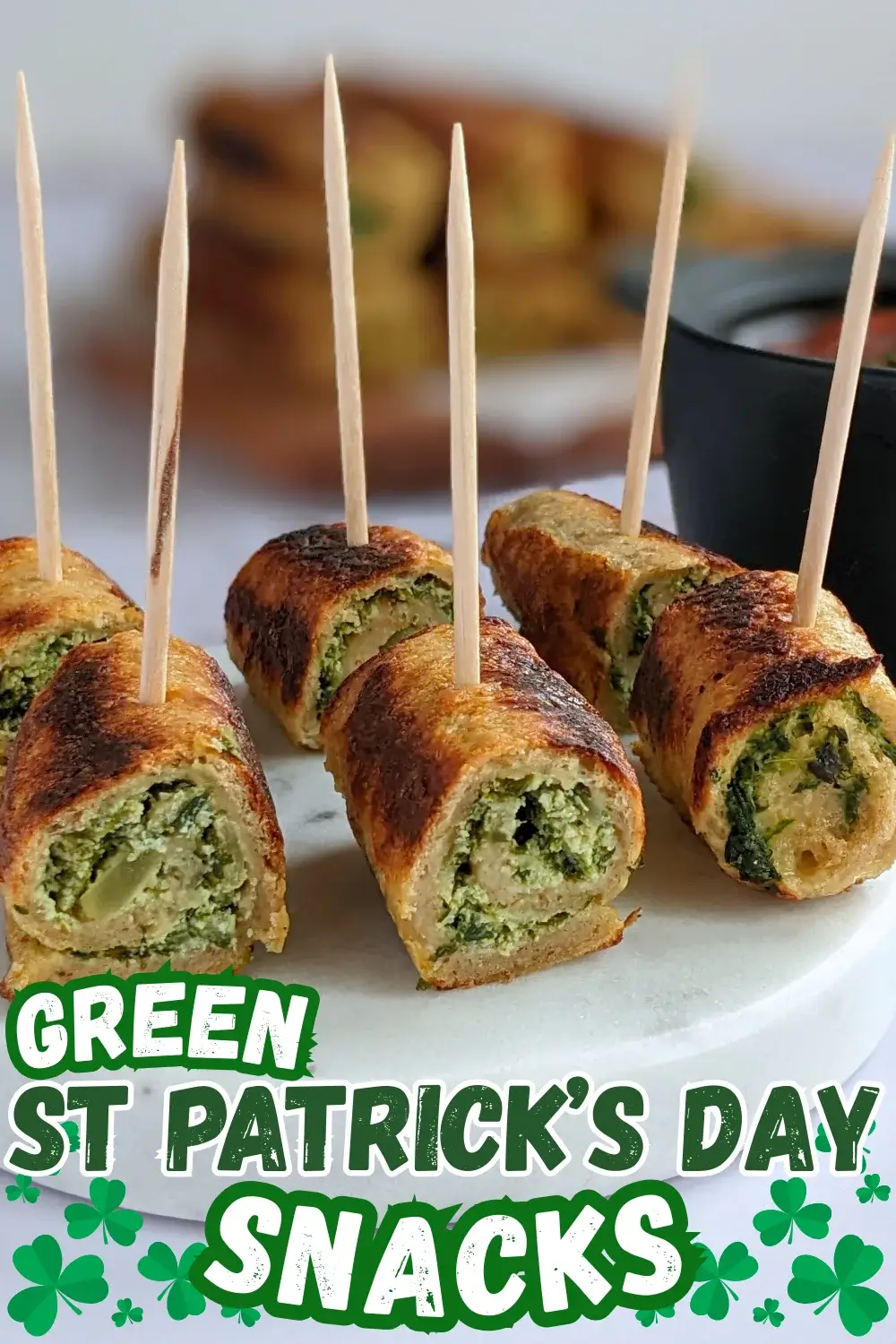 Savory Stuffed French Toast With Spinach and Ricotta - Italian-style savory stuffed French toast bread roll ups made with a garlicky spinach and ricotta filling served with marinara sauce.