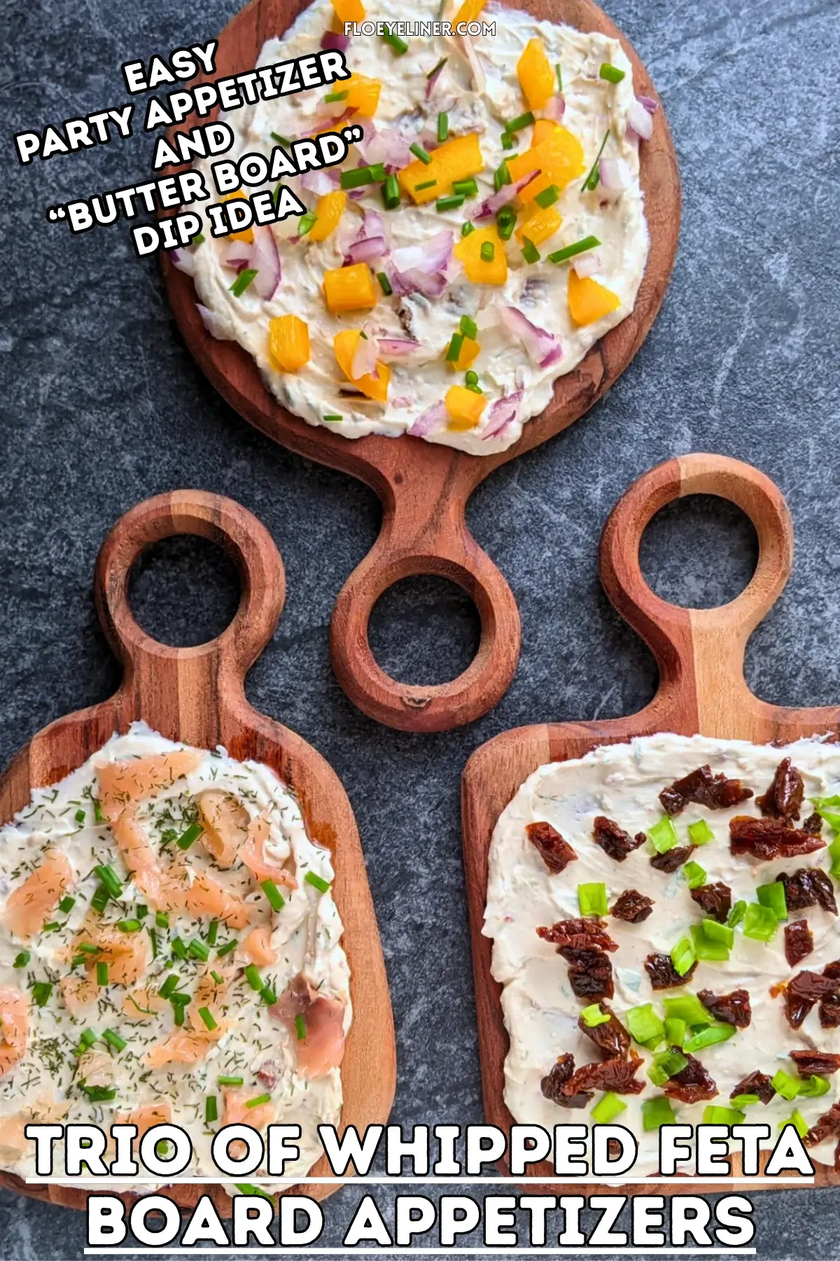 Trio of whipped feta board appetizers, one topped with smoked salmon and fresh chives, the other with sun-dried tomatoes and fresh green onions, and the third with yellow bell peppers, red onion, and fresh chives, all on a creamy feta dip base.
