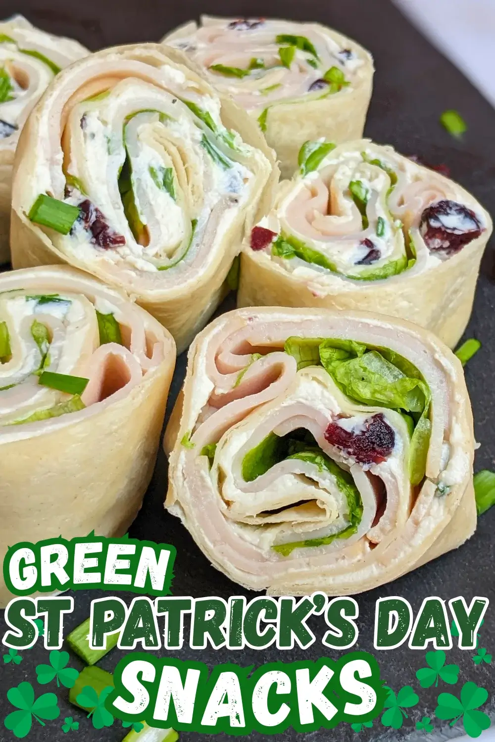 Turkey Pinwheels With Dried Cranberries - tortilla pinwheels with cream cheese filling, dried cranberries, turkey ham, and a bit of salad for color.