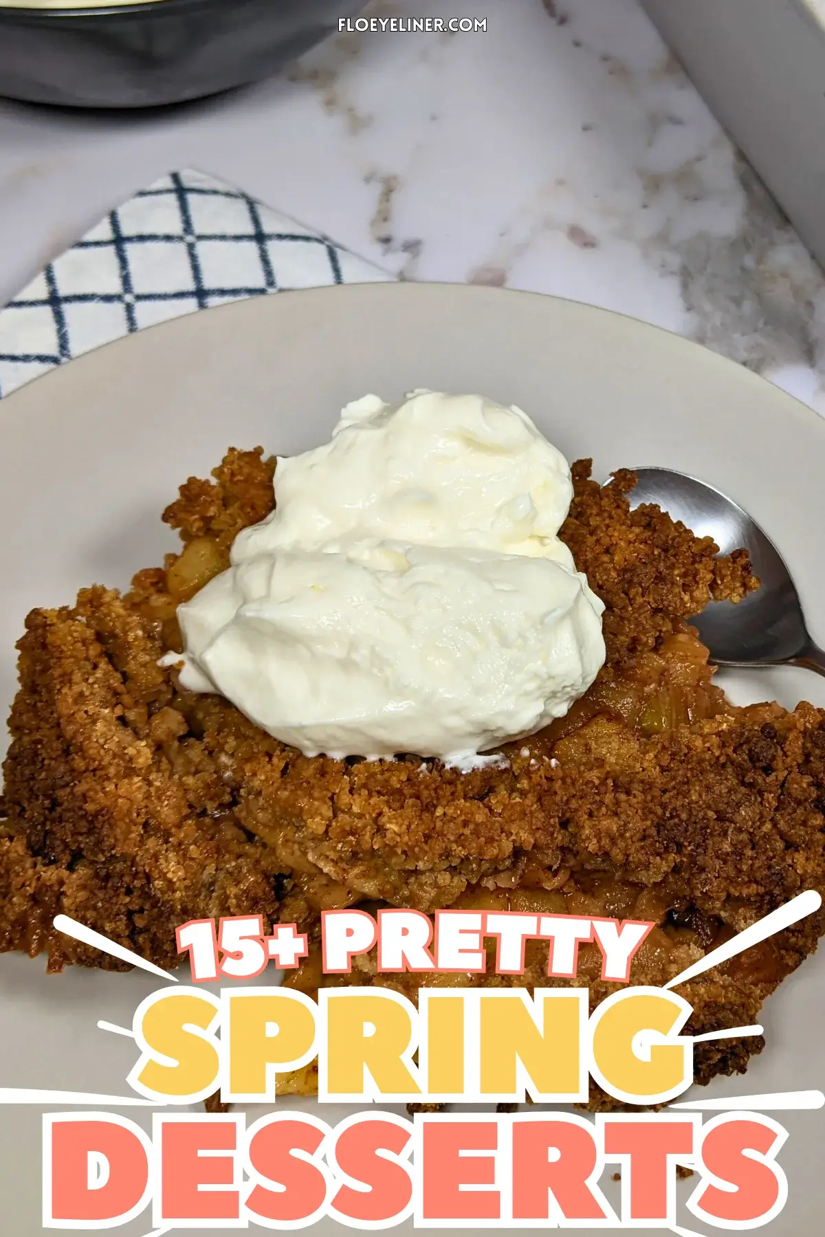 Apple Crumble with Rhubarb - Fruit-filled apple crumble with a golden, crumbly topping and chunks of rhubarb and apple at the bottom.